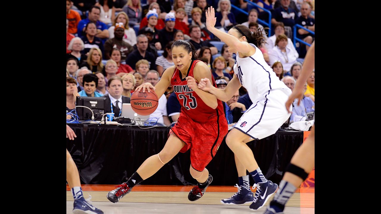 Shoni Schimmel of Louisville drives with the ball against Kelly Faris of UCONN on April 9.