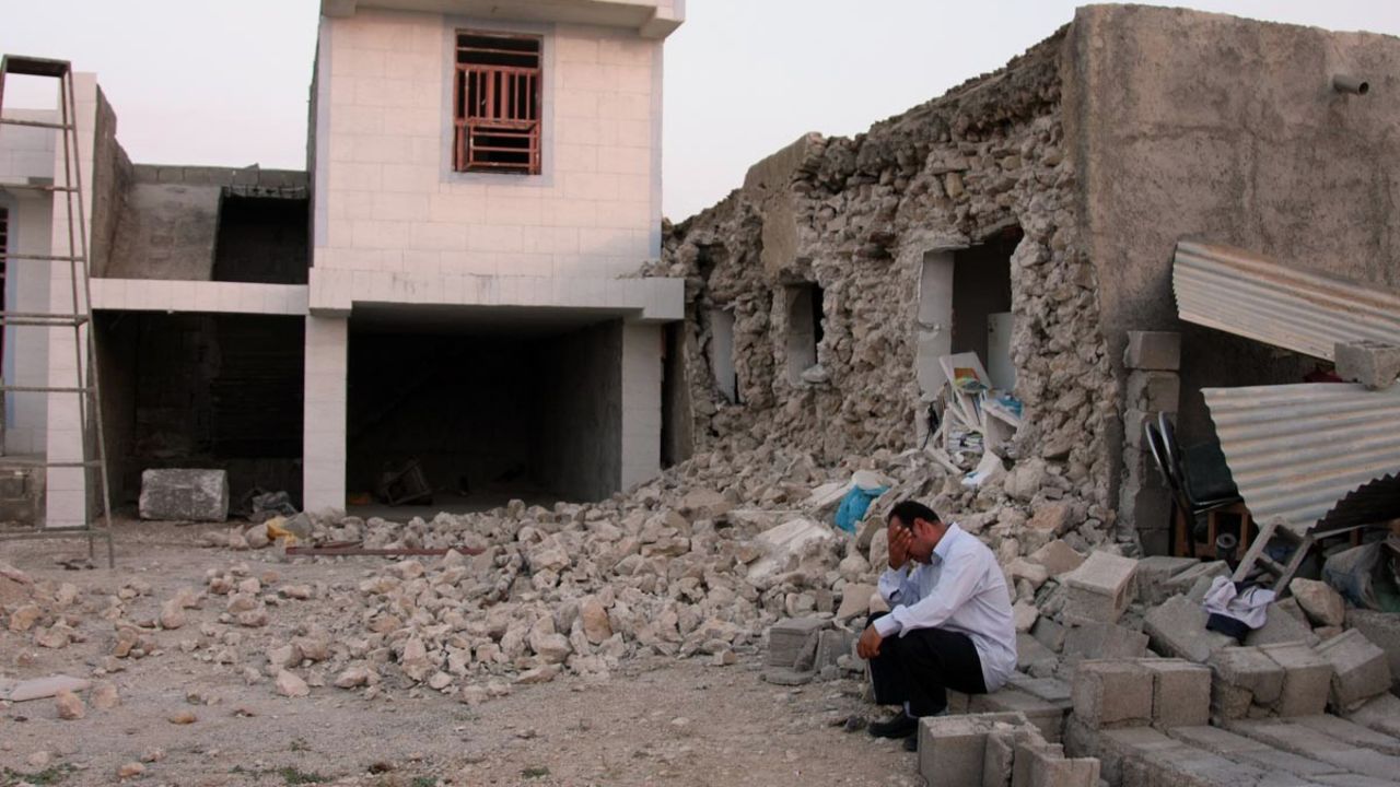 The quake leaves a man devastated after destroying his house in Shanbeh on April 9.