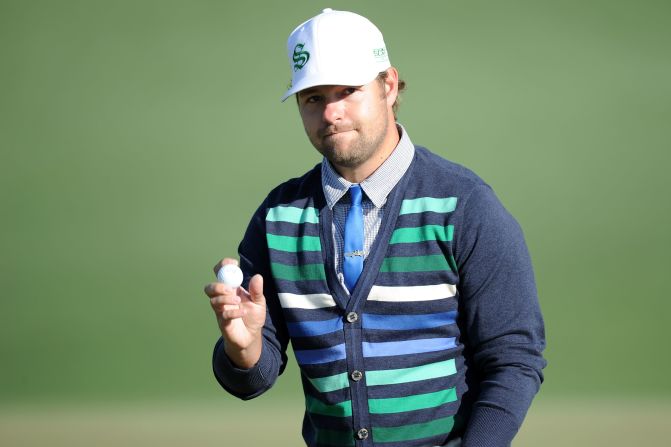 Ryan Moore, <a href="index.php?page=&url=http%3A%2F%2Fbleacherreport.com%2Farticles%2F2023504-masters-par-3-tournament-2014-results-analysis-and-twitter-reaction" target="_blank" target="_blank">who won the traditional Par 3 Contest at this year's Masters</a>, is known to sport a skinny tie with a cardigan. Here, he waves to the gallery on the second green during the 2010 Masters.