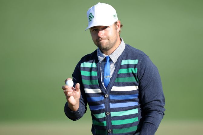 Ryan Moore, <a  target="_blank" target="_blank">who won the traditional Par 3 Contest at this year's Masters</a>, is known to sport a skinny tie with a cardigan. Here, he waves to the gallery on the second green during the 2010 Masters.