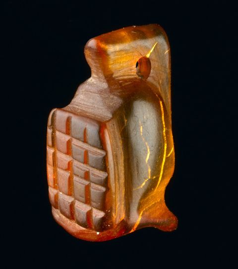 A complete amber Gladiator amulet. Seven meters of archaeology have been excavated, including remains covering the entire Roman occupation of Britain -- from the mid 40s AD to the early 5th century.