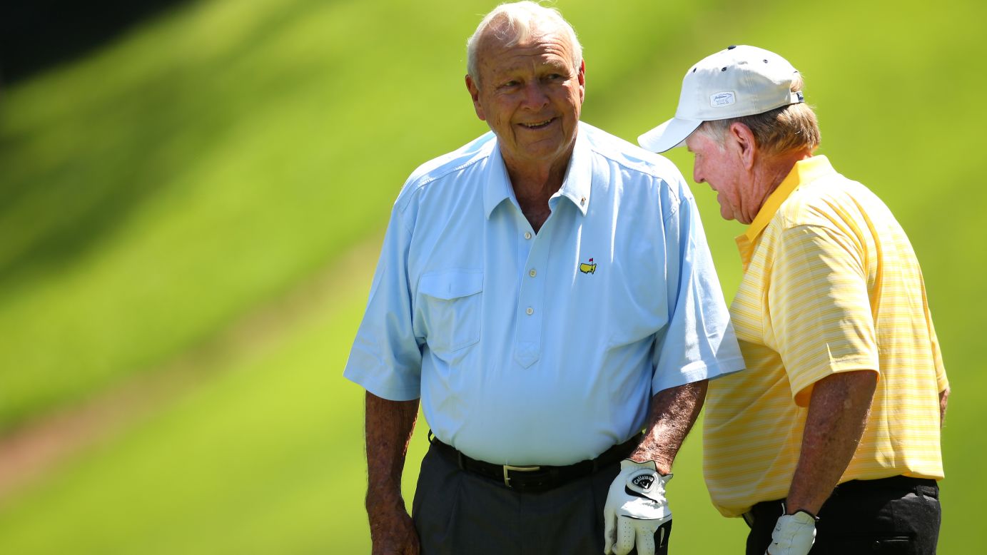 Jack Nicklaus, right, and Arnold Palmer share a laugh during the Par 3 Contest.