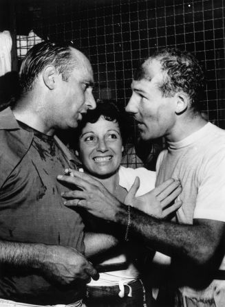 "El Maestro" Juan Manuel Fangio (left) and Stirling Moss engaged in discussion following the 1957 Italian grand Prix at Monza, which the Englishman won. The pair were teammates at Mercedes in 1955. "The team has always been the most important thing," says Moss. "Once you're with a company you really have to do what they tell you to. It's a professional business with very big money, which it wasn't (when I drove). Drivers are being paid like film stars now."