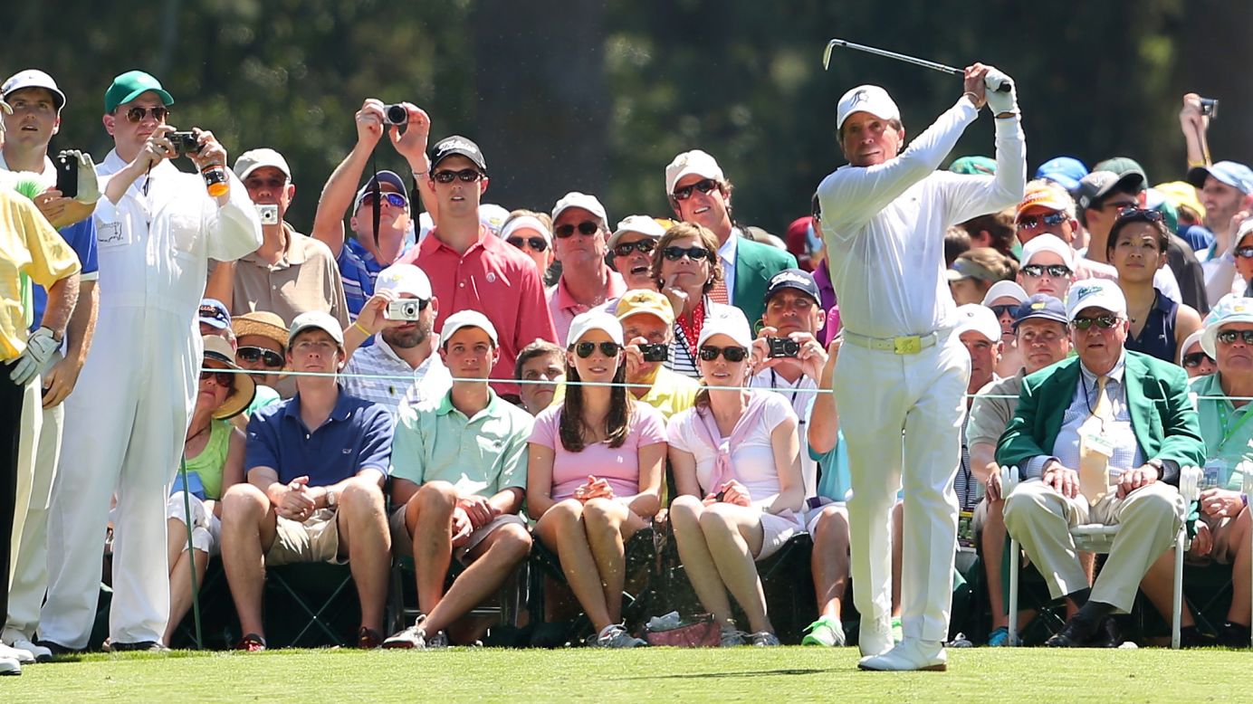 Gary Player of South Africa tees off.
