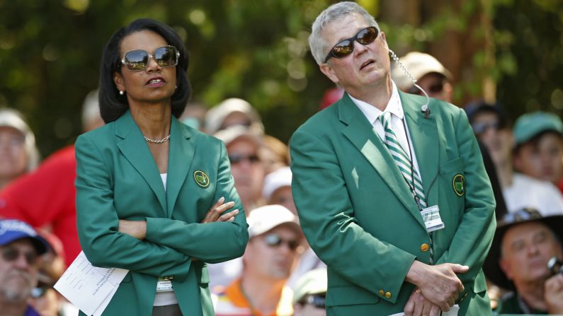 Condoleezza Rice, former U.S. secretary of state and new member of Augusta National Golf Club, looks on with member Bruce A. Lilly of Minnesota during the annual Masters Par 3 Contest.