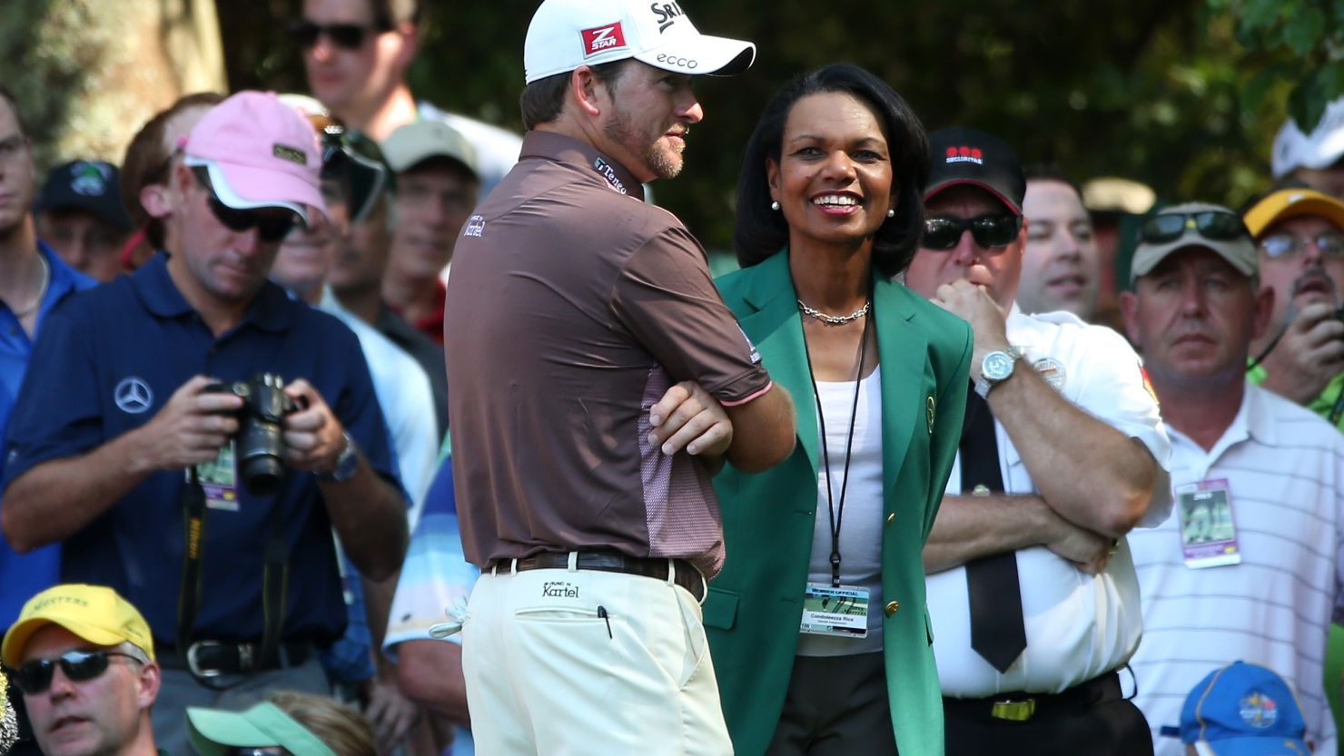 Condoleezza Rice wears the Augusta National Golf Club's members-only green jacket at the start of the Masters on Wednesday.
