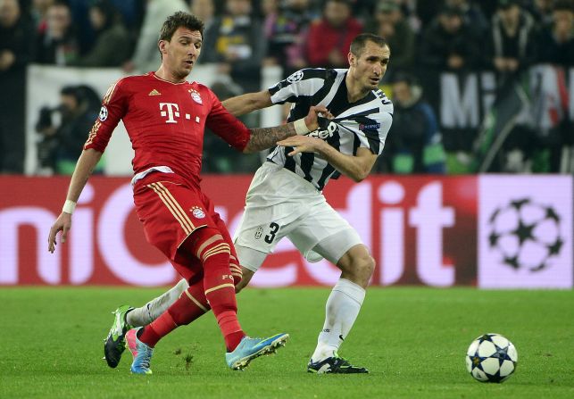Bayern Munich's Mario Mandzukic and Juventus' Giorgio Chiellini challenge for the ball during the second leg of the Champions League quarterfinal tie. Bayern won the opening contest 2-0 last week and arrived in Italy just days after winning the German title.