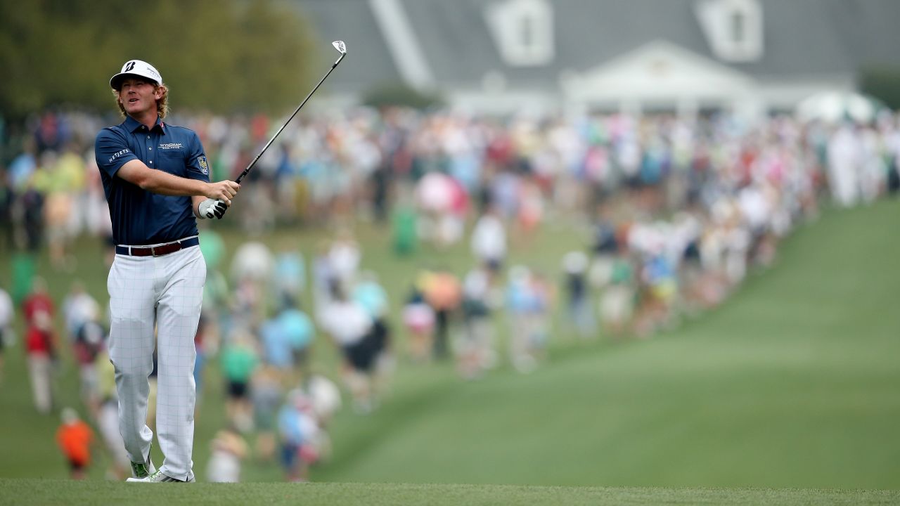Brandt Snedeker of the United States hits his second shot on the first hole.