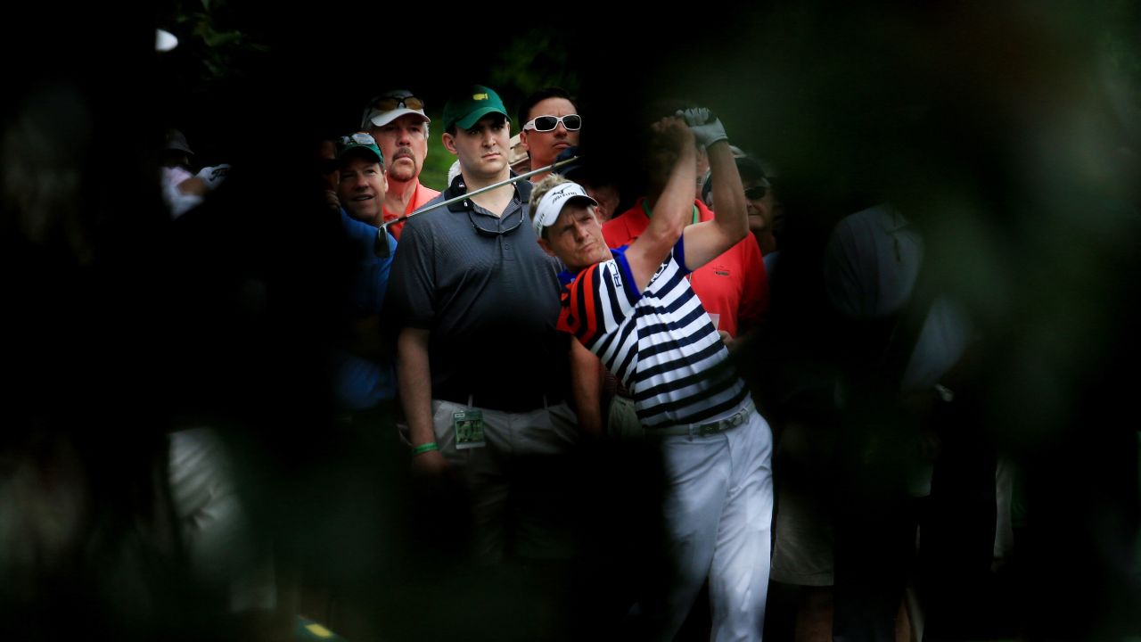 Luke Donald of England hits his second shot on the fifth hole.