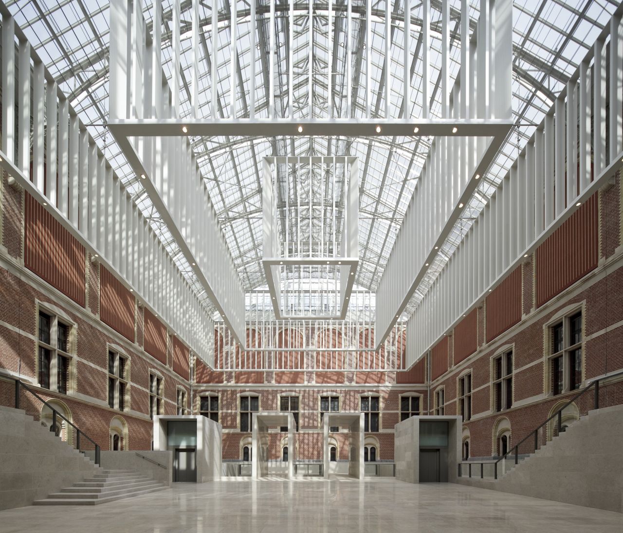 Contrasting ancient and modern, Spanish architects Cruz y Ortiz reinstated the building's original courtyards, which had been crammed with makeshift galleries for decades, linking them into one huge, bright and airy atrium.