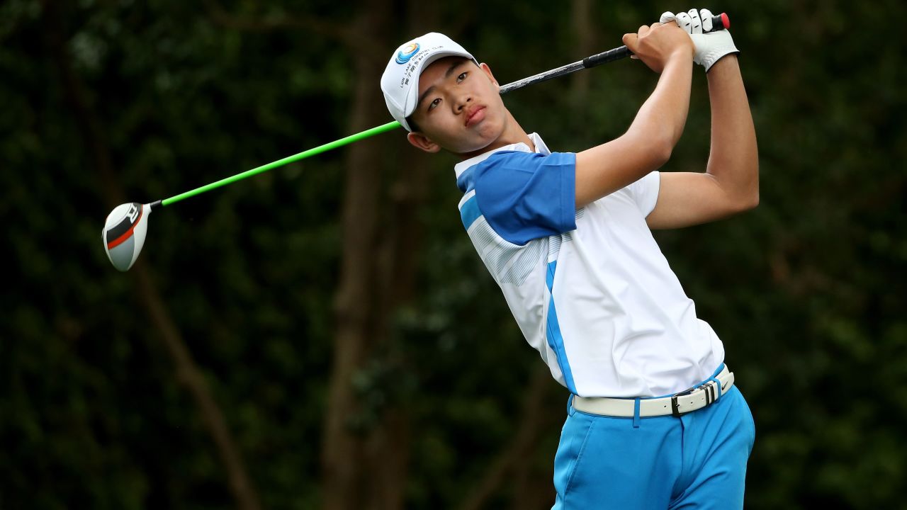 Tianlang Guan of China tees off on the second hole during the first round of the 2013 Masters Tournament at Augusta National Golf Club on Thursday, April 11 in Augusta, Georgia. Guan is the youngest competitor -- at the age of 14 years and five months -- in the 80 years of the tournament, beating the previous record held by then 16-year-old Matteo Manassero.