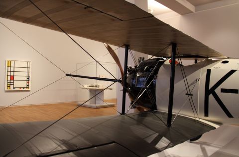 In the 20th Century galleries, Fritz Koolhoven's FK 23 Bantam plane sits alongside a painting by Piet Mondrian, both items considered the height of modernity in their era.