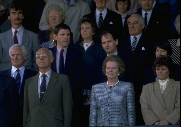 During her three terms in office, soccer experienced its darkest days. Hooliganism was rife, stadiums in a poor shape. Thatcher responded with draconian measures to stamp out the problem, forever alienating many soccer fans. In this picture she is attending the 1988 Scottish Cup final. Several figures within soccer suggested that this weekend's matches should see a minute silence before kick-off, which prompted a furious reaction from fans.