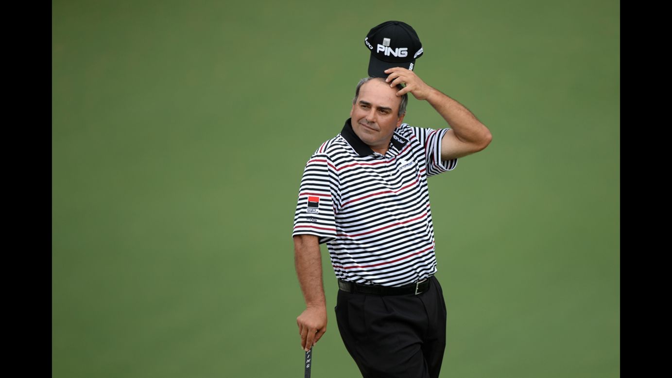 Argentina's Angel Cabrera appears disappointed after missing a putt on the second hole on April 12.