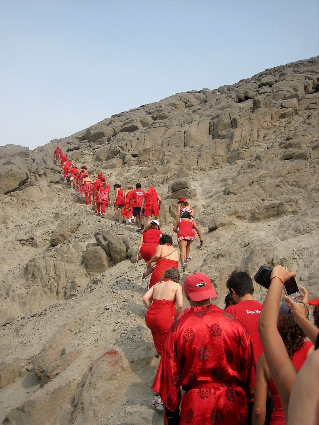 This traditional Red Dress Run covers rocky terrain in Peru.