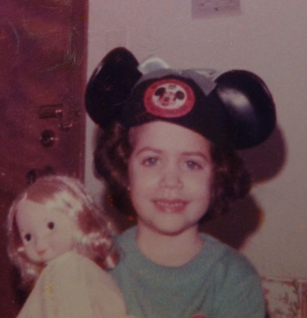 Allison Dasso of Chicago runs the fan site <a href="http://waltdatedworld.bravepages.com/" target="_blank" target="_blank">Walt Dated World</a>, and took her first trip to Walt Disney World at age 4 in 1978. That first time, she didn't bring her <a href="http://ireport.cnn.com/docs/DOC-954859">mouse ears</a> from home. "I ended up buying a Donald Duck cap with a beak that squeaked. To this day when I look at the pictures, it just doesn't seem right when I see a duck on my head instead of a mouse. It felt like I was cheating on Mickey." She more than made up for it on future trips, wearing her many different mouse ears with pride.