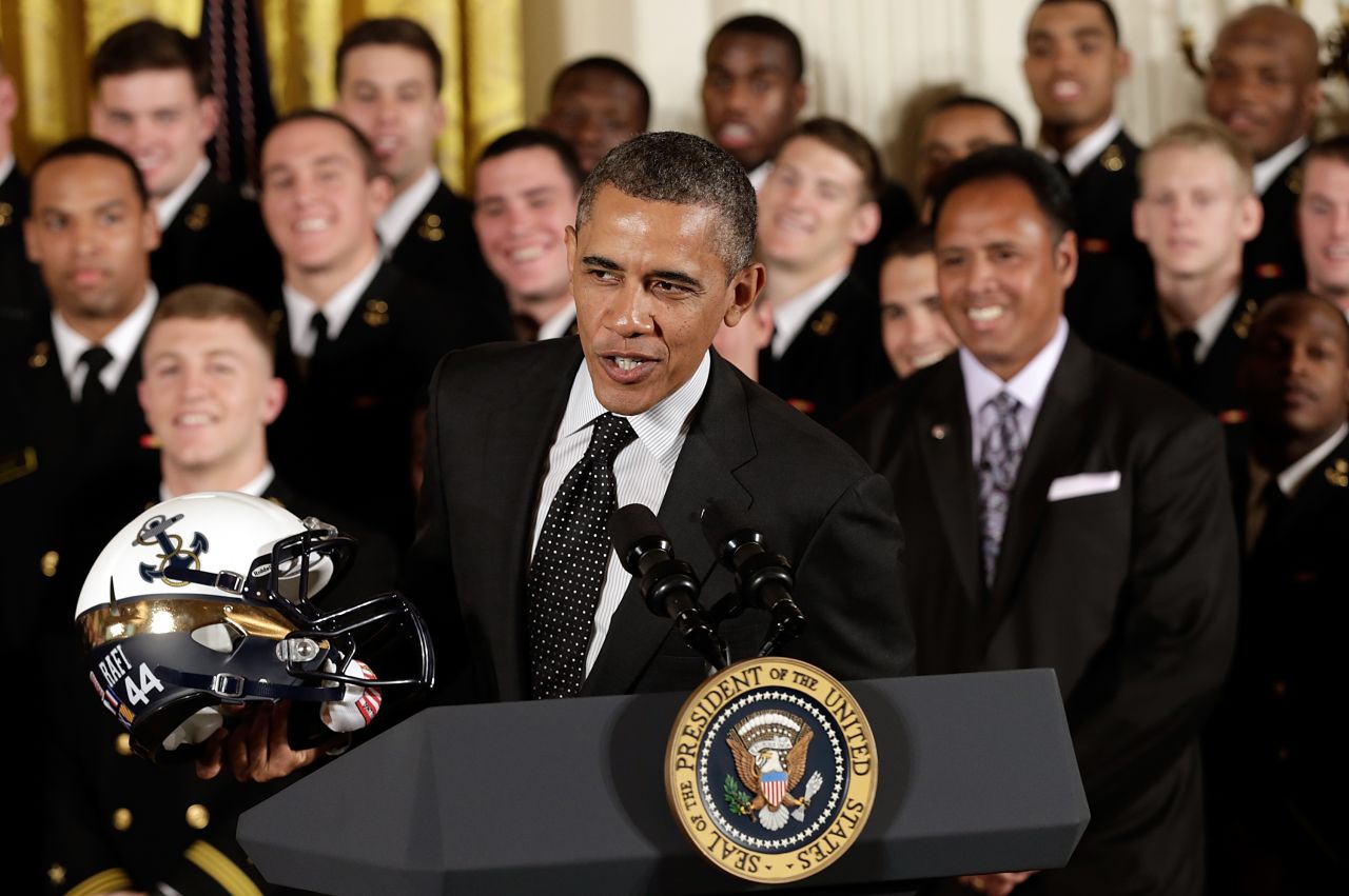 President Barack Obama opted not to try on the Naval Academy football helmet presented to him during a ceremony at the White House on Friday, April 12. "Here's the general rule: You don't put stuff on your head when you're president," he said to laughter. "So, that's politics 101. You never look good when you are wearing something on your head." Take a look back at presidents who have broken the rule.