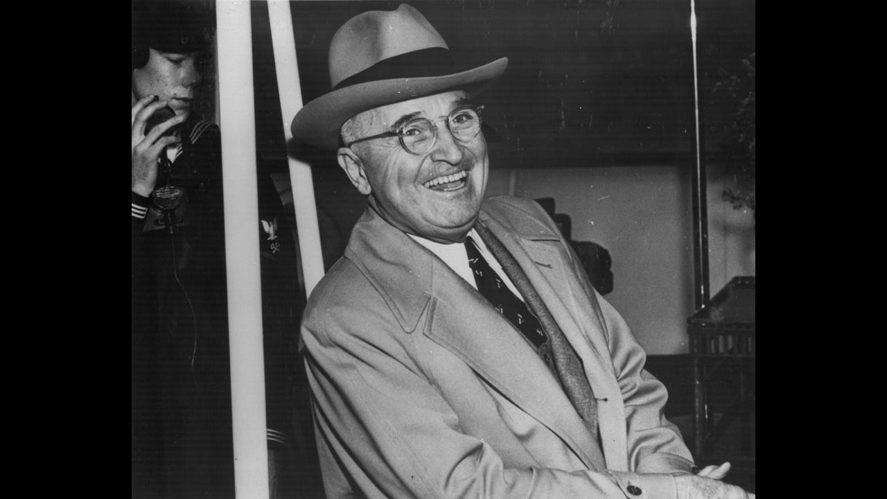 President Harry S. Truman boards the presidential yacht USS Williamsburg, formerly a Navy gunboat, bound for Florida on vacation in 1950.