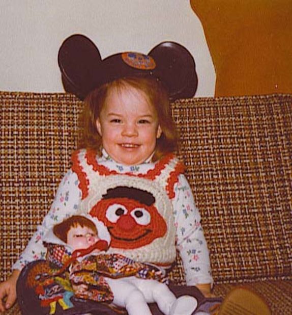 Jen Cook grew up in Northbrook, Illinois, loving <a href="http://ireport.cnn.com/docs/DOC-953658">Disney and Mickey Mouse</a>. "It was my first stuffed animal and I still have him.  He's in rough shape but was always with me ... in the hospital, at college and even now as a parent," she says.
