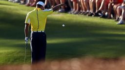 AUGUSTA, GA - APRIL 12:  Tiger Woods of the United States drops his ball after he hits it into the water on the 15th hole during the second round of the 2013 Masters Tournament at Augusta National Golf Club on April 12, 2013 in Augusta, Georgia.  (Photo by Mike Ehrmann/Getty Images)