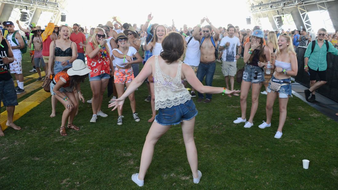 Fans dance during Day One of the festival on April 12.
