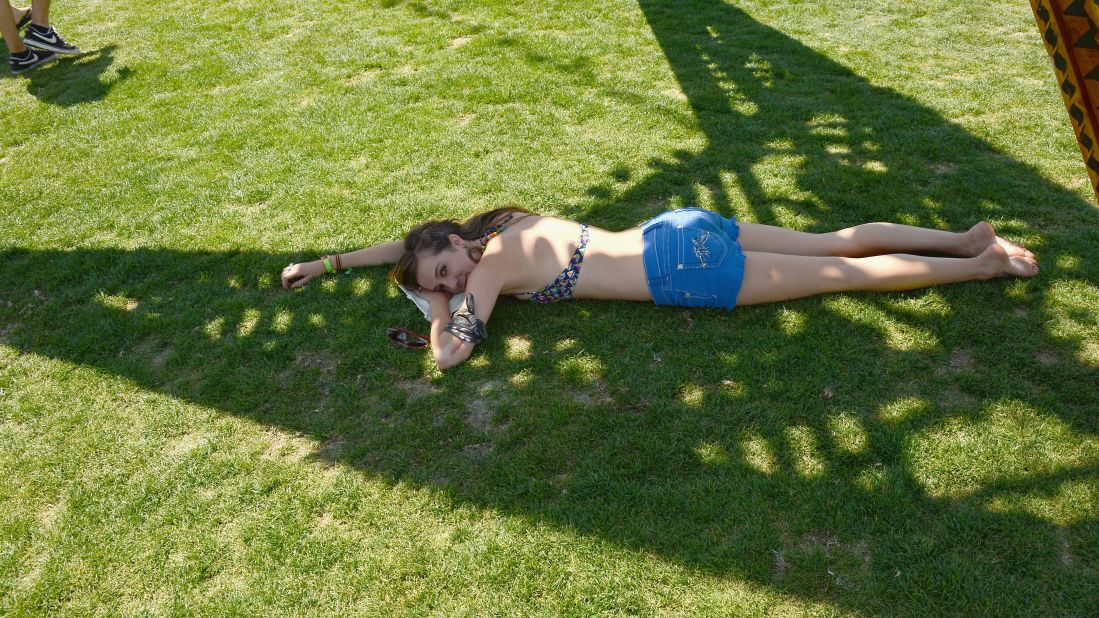 A festival-goer enjoys the shade on Day One of Coachella on April 12.