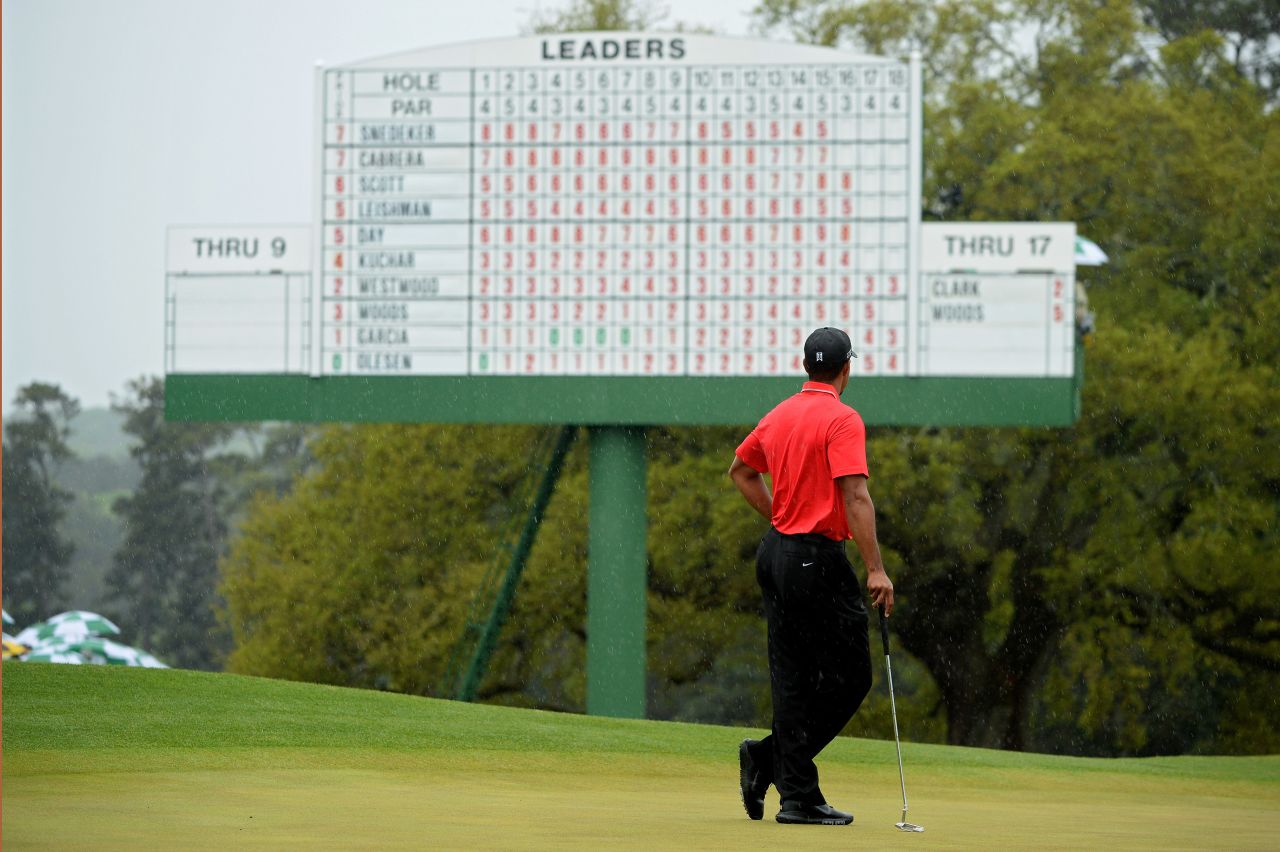 Tiger Woods of the U.S. stands on the 18th green.