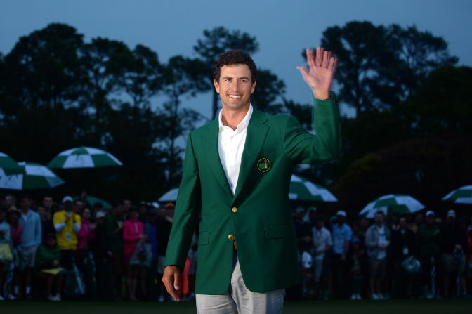 Adam Scott of Australia smiles while wearing the green jacket after winning the 2013 Masters Tournament at Augusta National Golf Club in Augusta, Georgia, on Sunday, April 14. Scott captured golf's most prestigious event in an oh-so-close sudden-death playoff with Angel Cabrera. Click through to see all the shots from the fourth day and <a href="index.php?page=&url=http%3A%2F%2Fwww.cnn.com%2F2013%2F04%2F13%2Fgolf%2Fgallery%2Fmasters-round-three%2Findex.html" target="_blank">look back at the third round</a>.