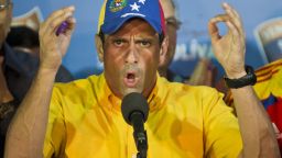 Venezuelan presidential candidate Henrique Capriles speaks during a press conference in Caracas on April 15, 2013. Venezuelans on Sunday awaited the results of the election to replace late leader Hugo Chavez, with his handpicked political heir favored to win, as the opposition candidate warned of vote manipulation. AFP PHOTO/RONALDO SCHEMIDT (Photo credit should read Ronaldo Schemidt/AFP/Getty Images)