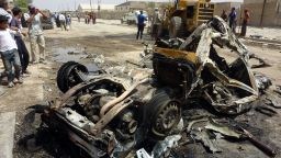 The remains of a vehicle is seen following an explosion in the al-Obaidi neighborhood, east of Baghdad, on April 15, 2013. 
