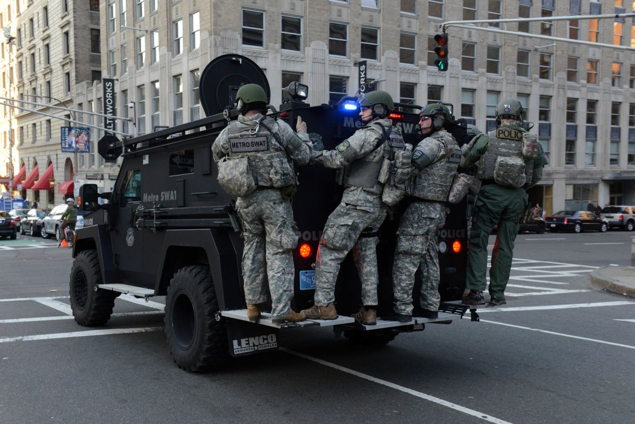 A SWAT team arrives on the scene.