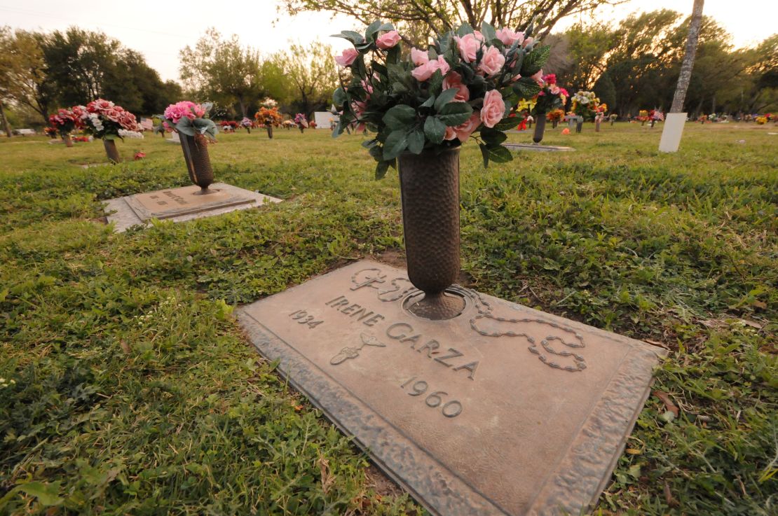 Cousin Noemi Sigler visits Garza's grave. She has promised to "never leave her behind."