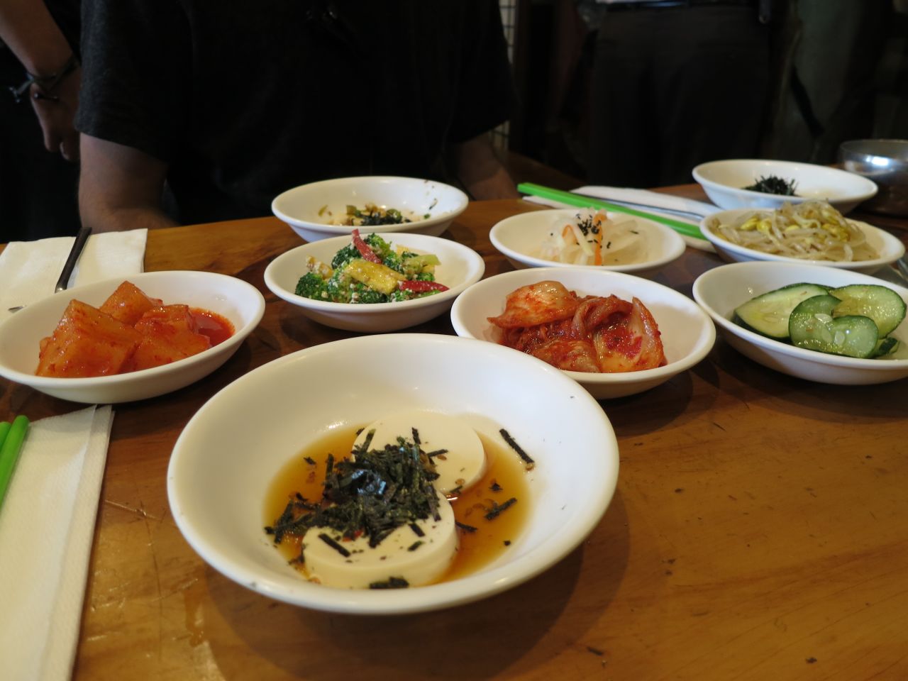 Ban chan, including kimchi, pickled vegetables, bean sprouts and silken tofu at Beverly Soon Tofu Restaurant.