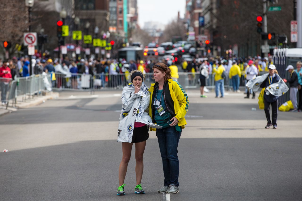 A runner is comforted following the attack.