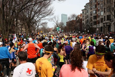 Runners gather near Kenmore Square after the explosions.