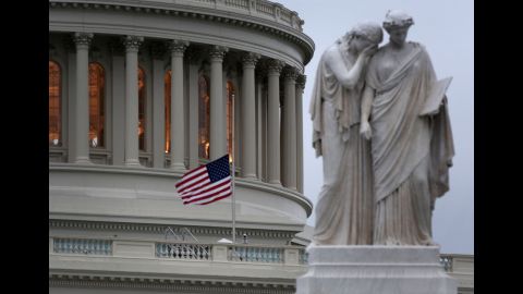 An American flag flies at half-staff at the Capitol building in Washington on April 15, 2013.