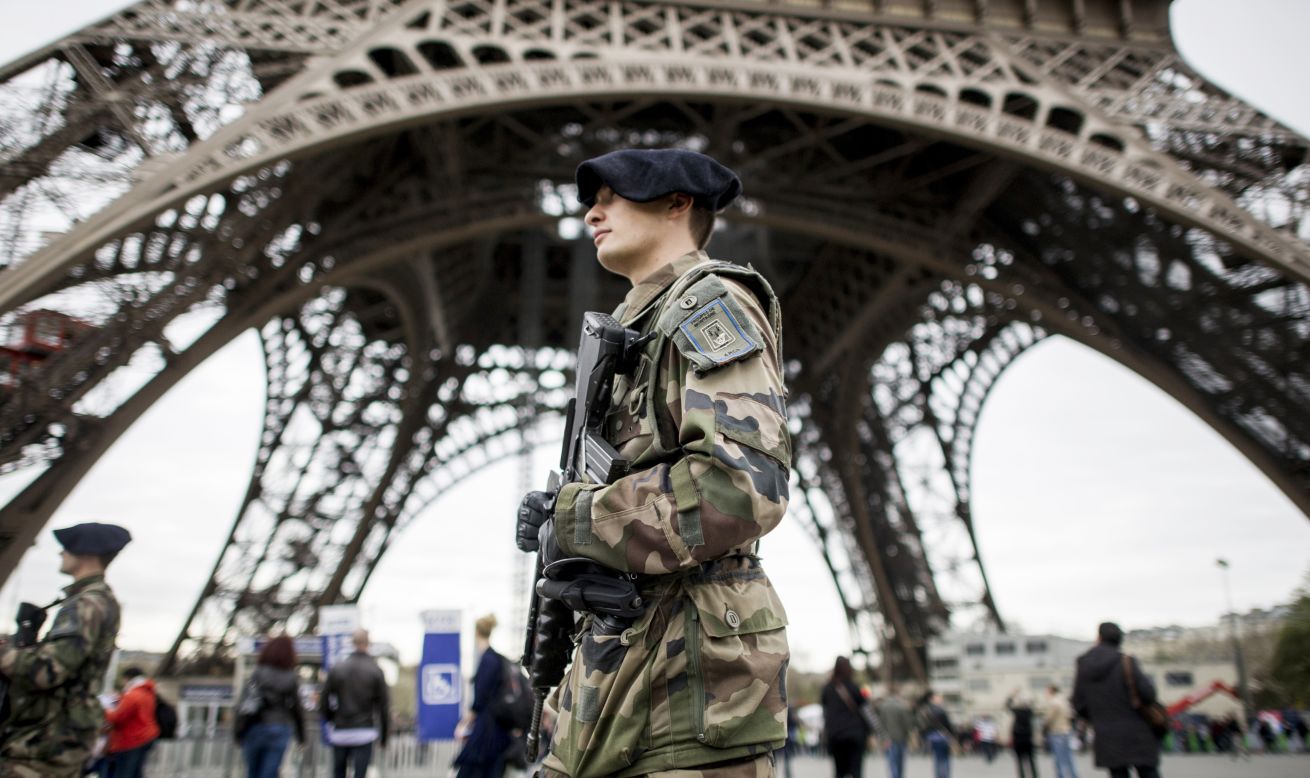 French soldiers patrol the Eiffel Tower in Paris on April 16. Security in public areas and events was stepped up after the bombings.