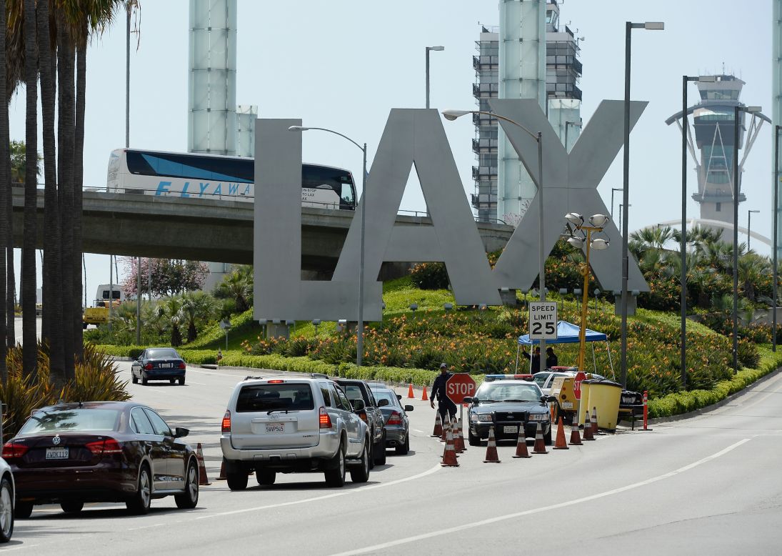 Cars stop at a checkpoint at Los Angeles International Airport on Monday.