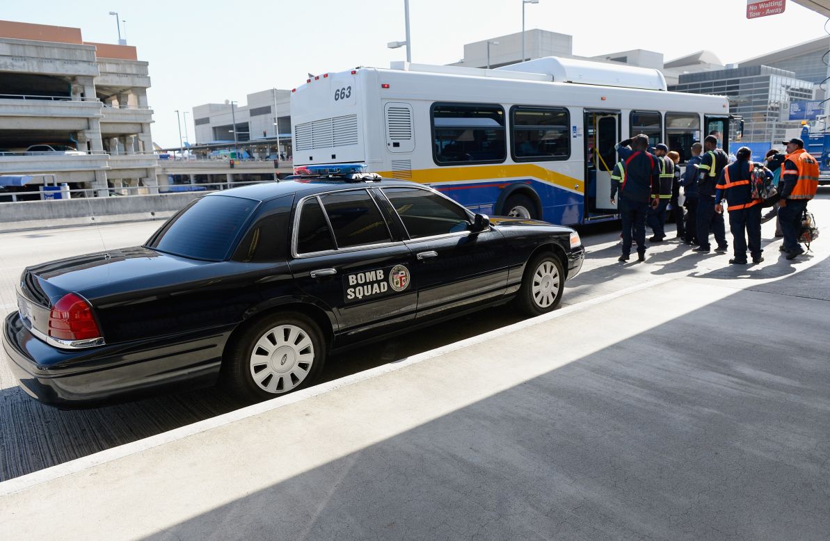 A bomb squad vehicle is parked at the Los Angeles International Airport departures terminal on Monday.