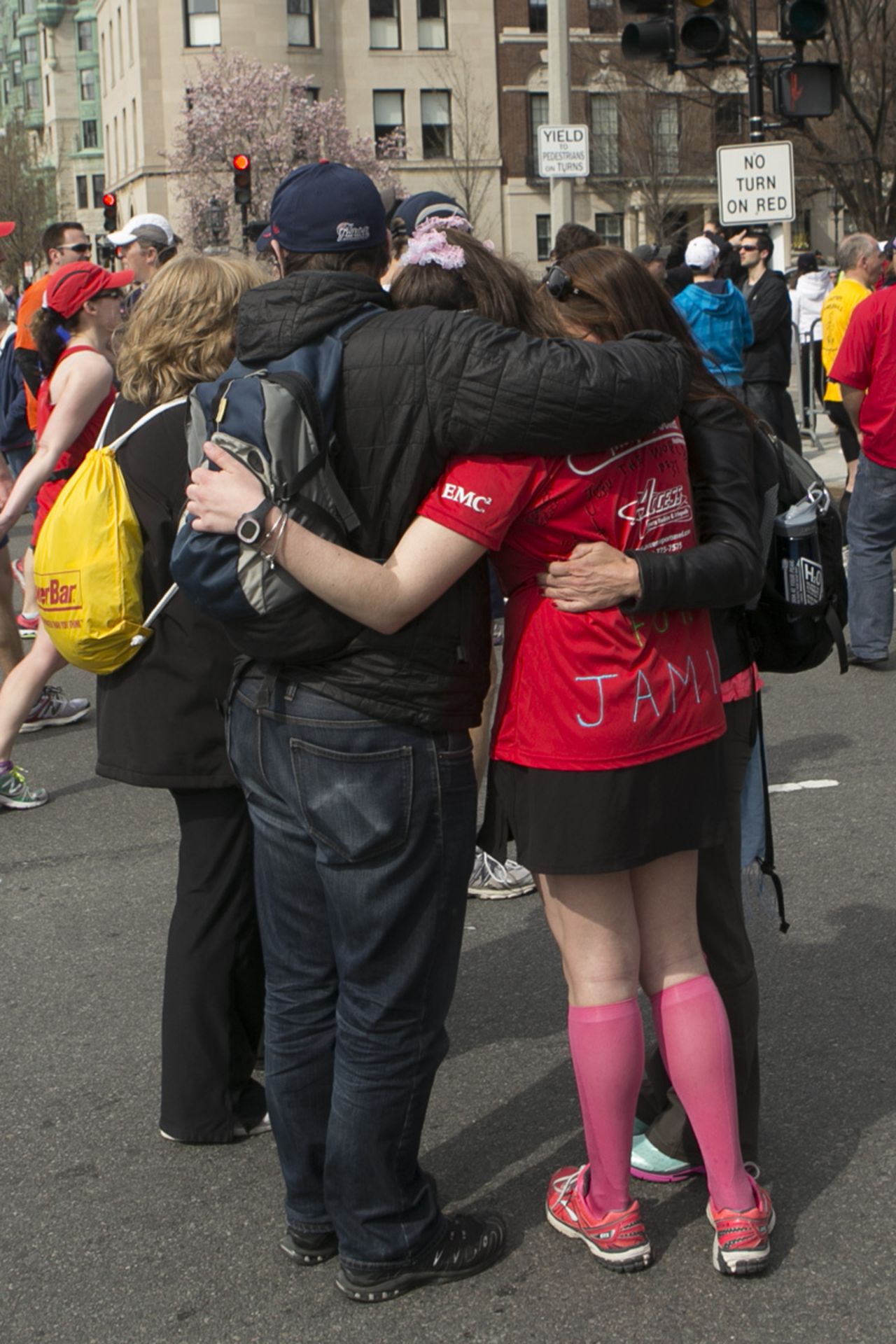 <a href="http://ireport.cnn.com/docs/DOC-957434">Andrea Catalano</a>, a freelance photographer, shot this photo about a mile from the Boston Marathon finish line. He wanted to capture the outpouring of support from spectators and people in the area, comforting and assisting runners.