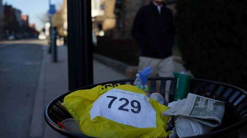 A runners bib lies discarded April 16. <a href="index.php?page=&url=http%3A%2F%2Fwww.cnn.com%2FSPECIALS%2Fus%2Fboston-bombings-galleries%2Findex.html">See all photography related to the Boston bombings.</a>v