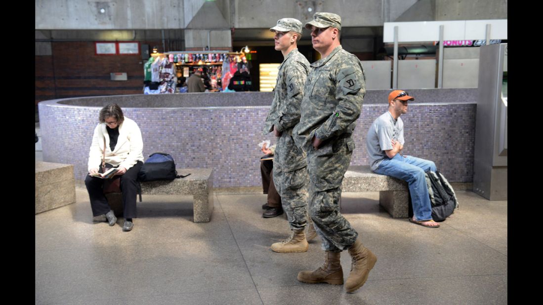 National Guardsmen patrol the Back Bay Station on April 16 as security remains tight in Boston.