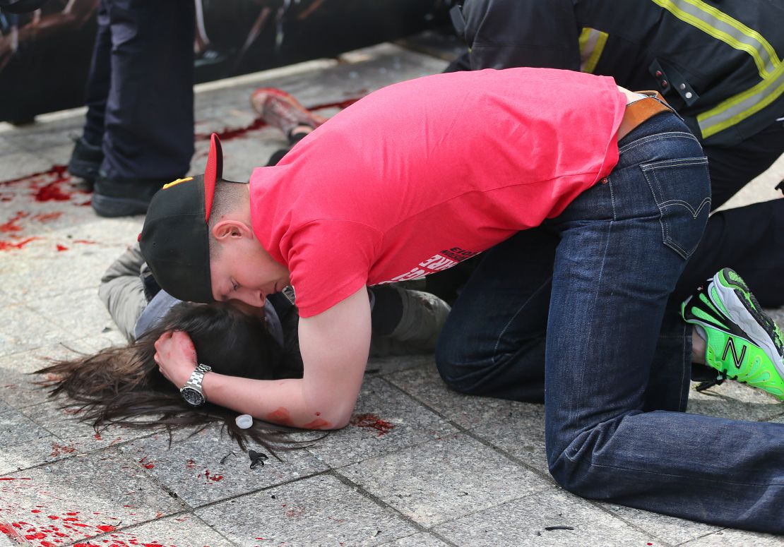 This Boston Globe photo from the attack's aftermath went viral, but with a fake story attached to it.