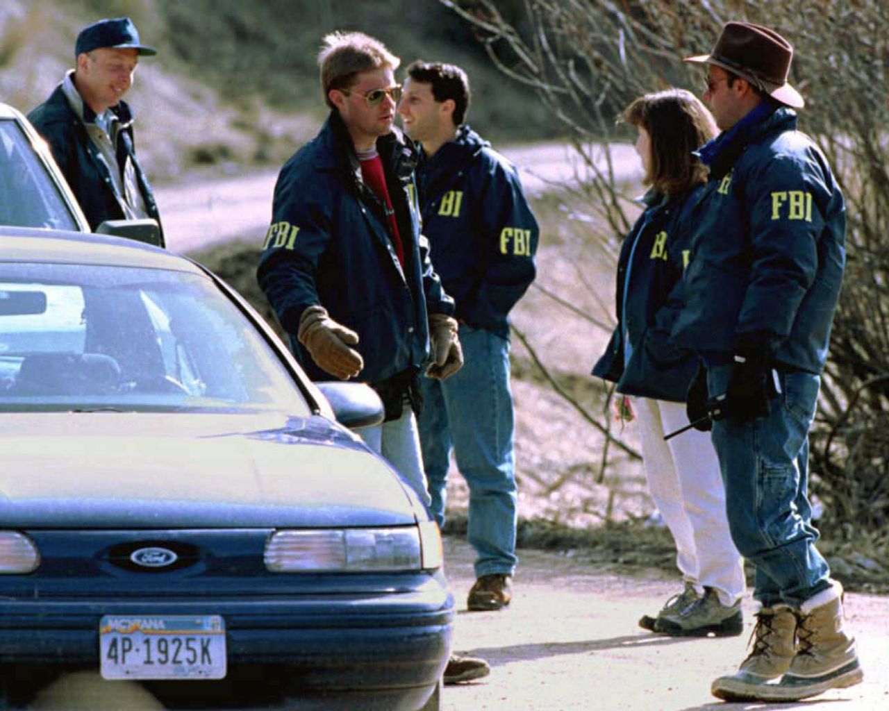 Three people were killed and 23 others were wounded after a string of mail bombings carried out by Ted Kaczynski, aka "The Unabomber," from 1978 to 1995. Here, FBI agents guard the entrance to Kaczynski's property in Lincoln, Montana, on April 5, 1996. In May 1998, Kaczynski received eight life sentences for his crimes.