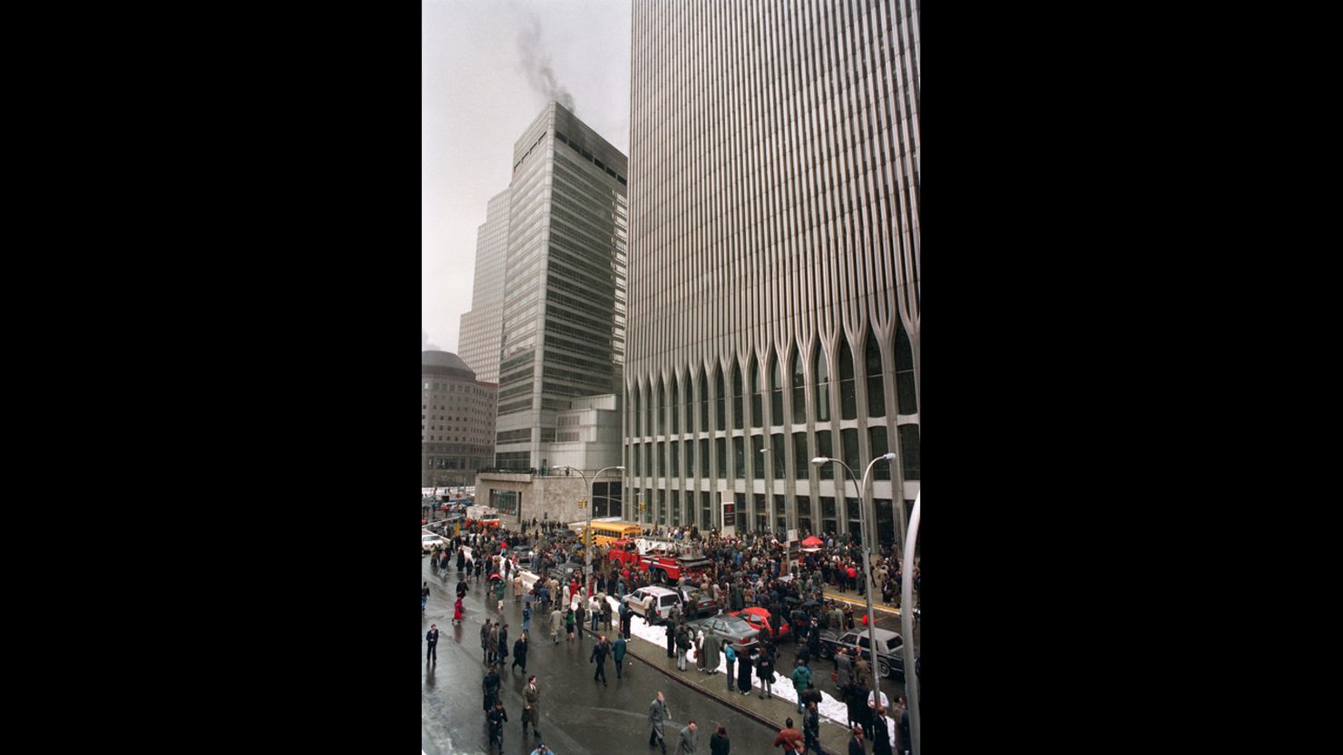 Firefighters and rescue crews work outside the World Trade Center after smoke swept through the 110-story building after the ceiling of a train station collapsed 26 February 1993. MARIA BASTONE/AFP/Getty Images)