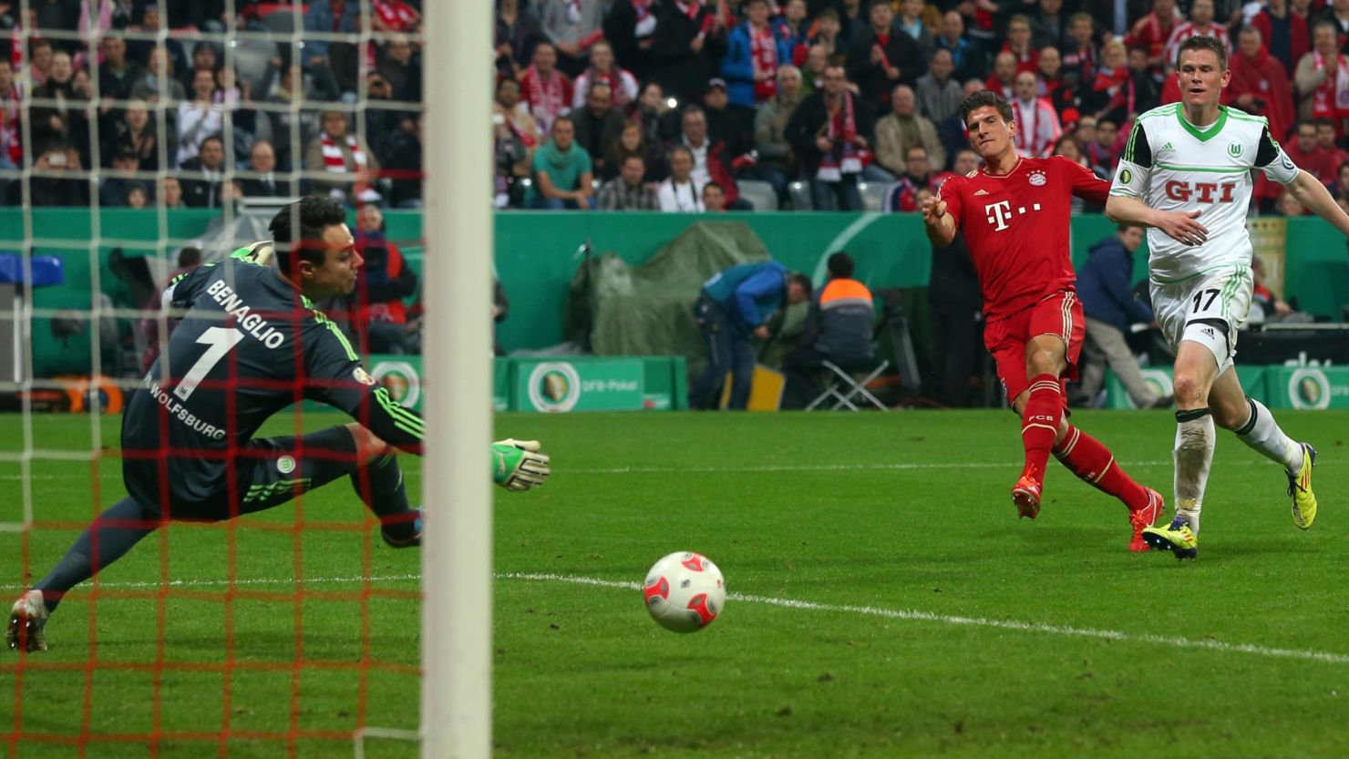 Mario Gomez fires home as Bayern Munich continued their march towards the German Cup title