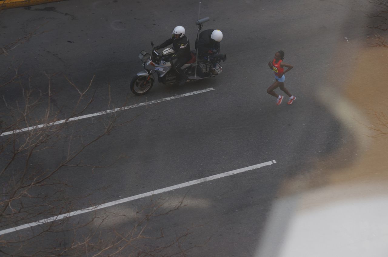 Kenyan runner Rita Jeptoo, who finished first in the women's race, makes her way toward the finish line.