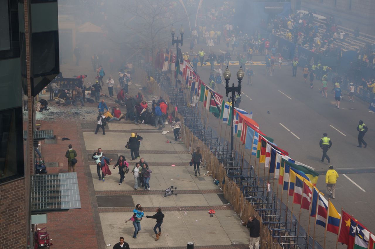 Bystanders clear the area.