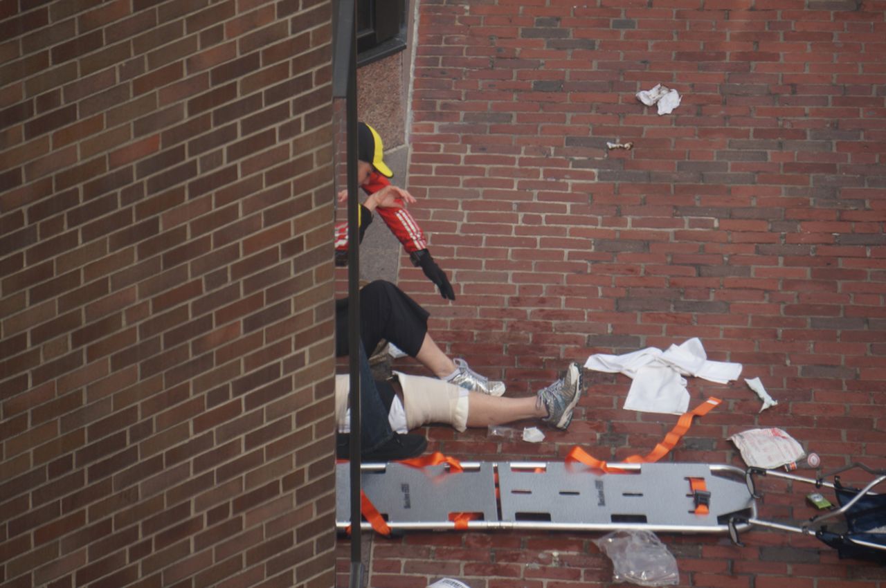 An injured person receives help.