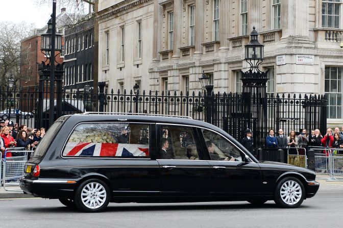 The hearse makes its way past Downing Street in London. 
